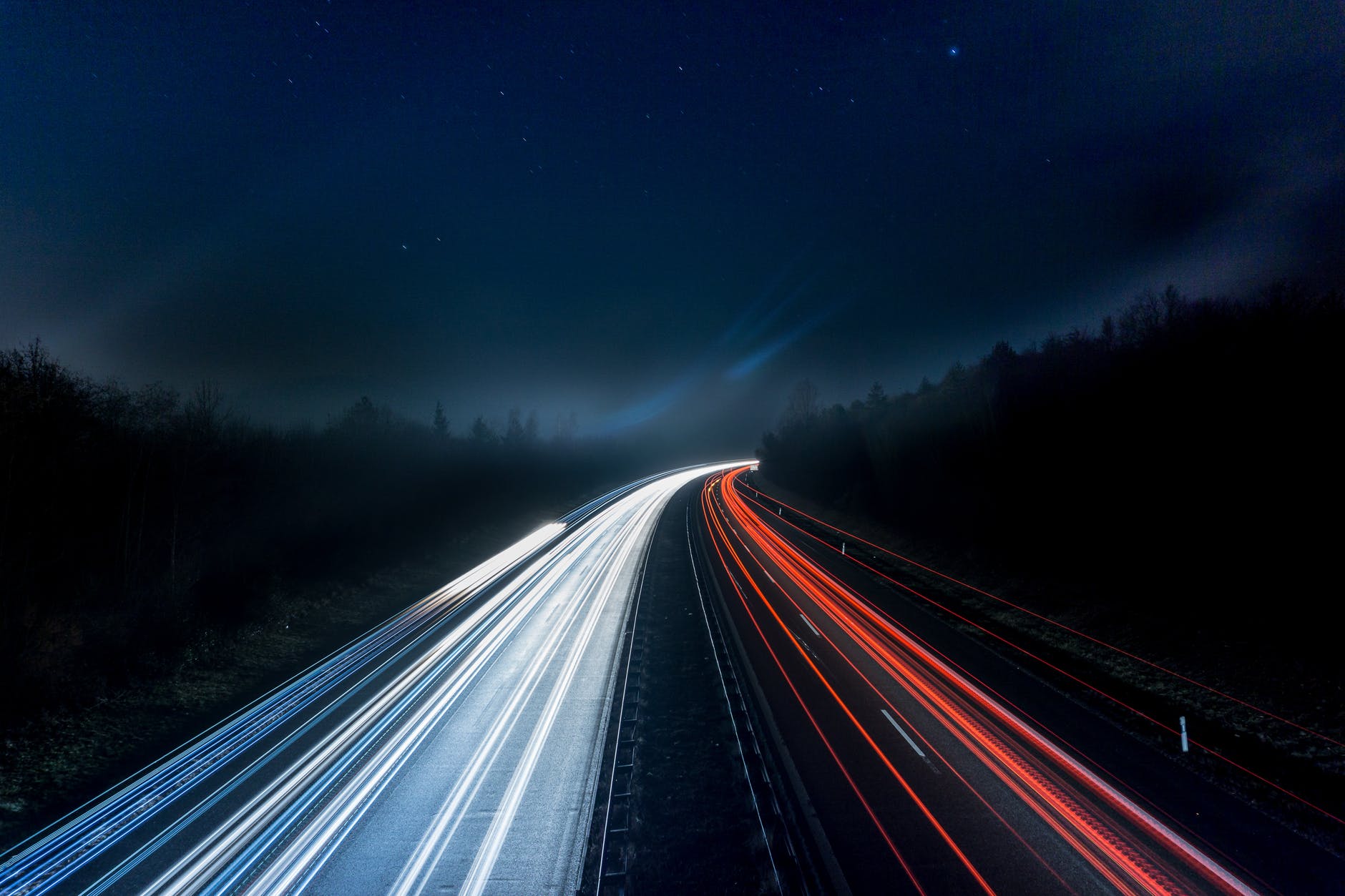 light trails on highway at night